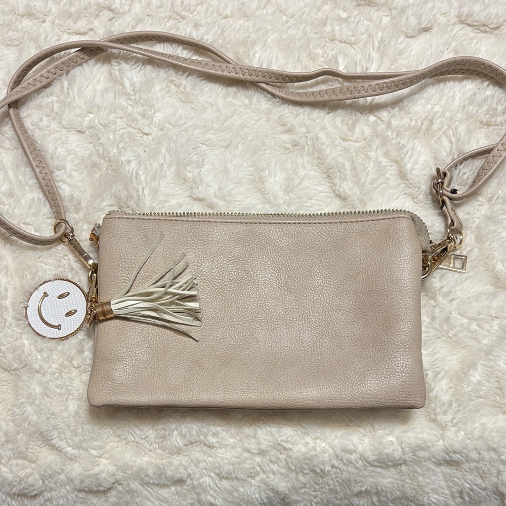 Chic Beige Leather Crossbody Bag with Tassel